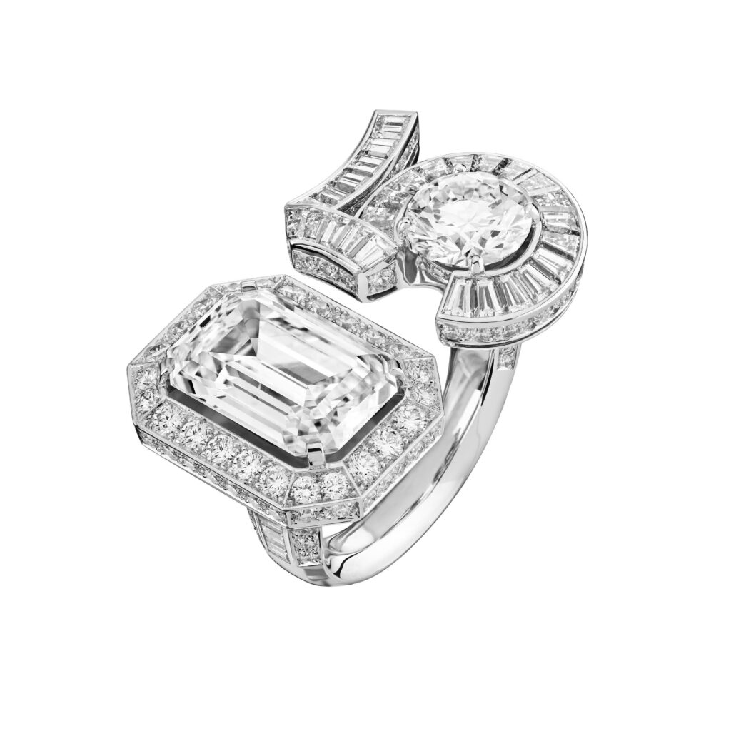 CHANEL - A precious lucky charm. The ETERNAL N°5 ring in white gold is set  with a center stone surrounded by diamonds that trace the shape of a 5, Gabrielle  Chanel's favorite