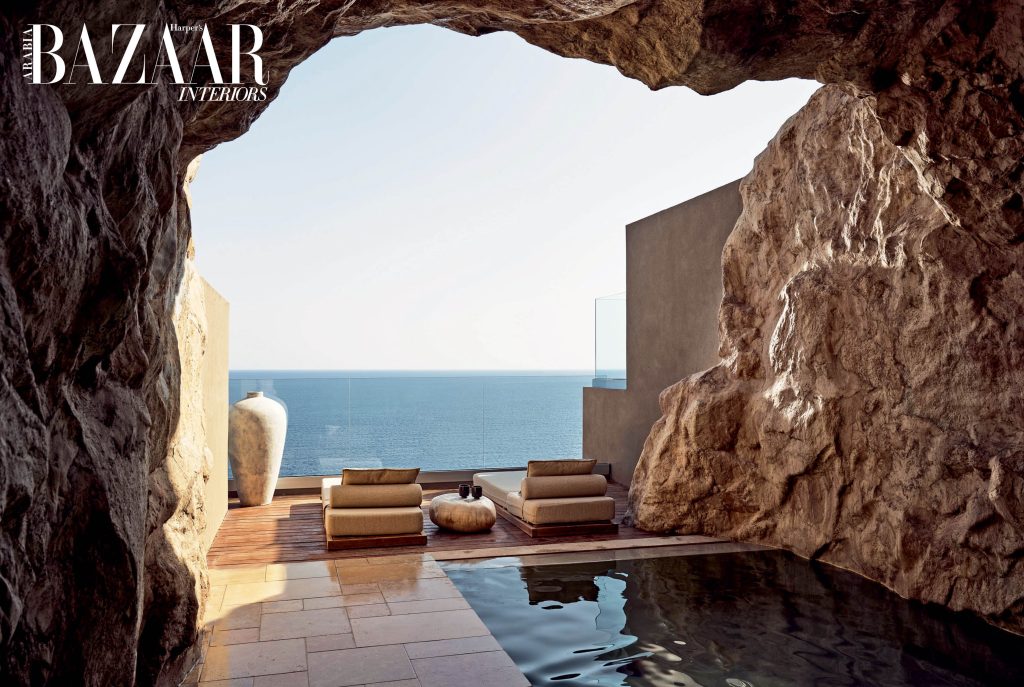 Echoing the rough-hewn cliffs, ACRO Suites appears to be a part of the landscape itself.