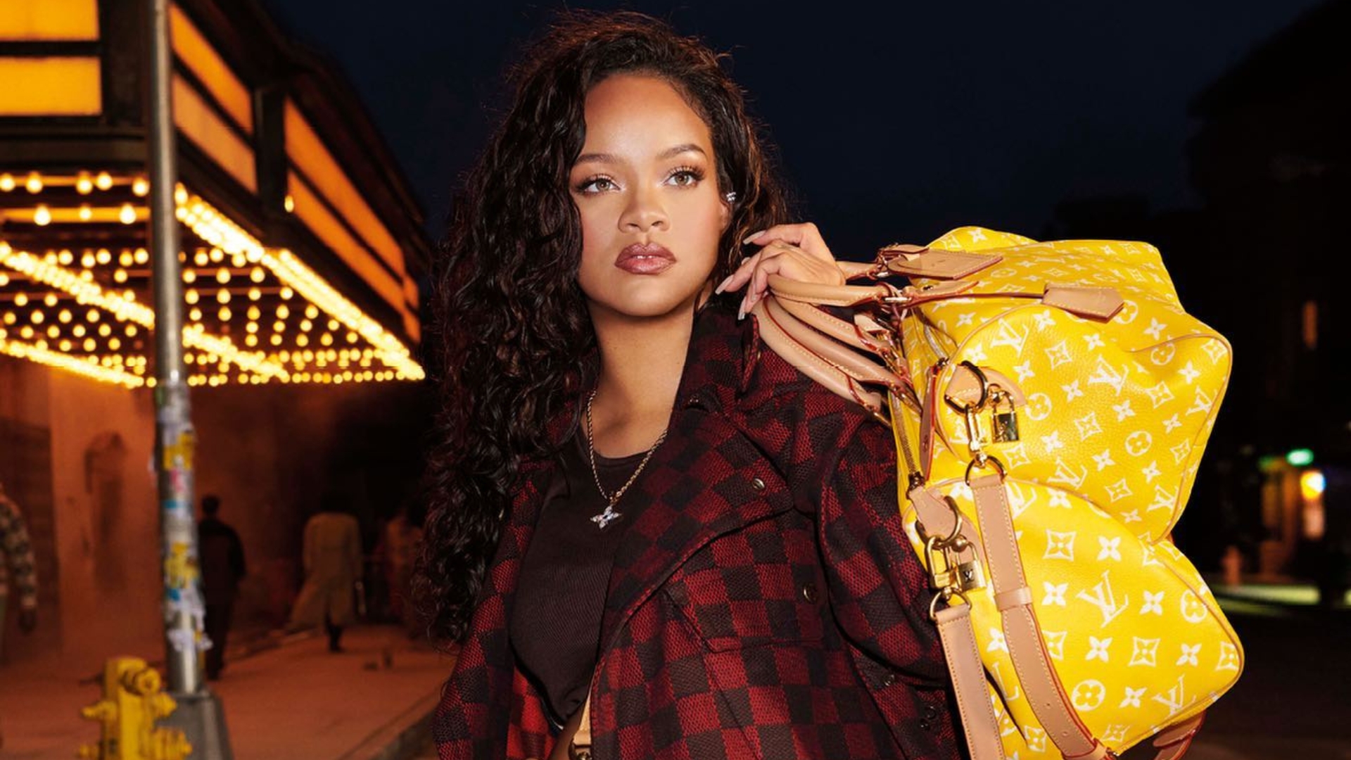A Pregnant Rihanna Stuns In Louis Vuitton's New Speedy Handbag