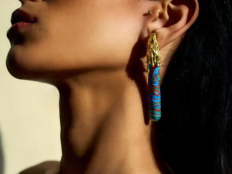 Woman wearing colourful earrings
