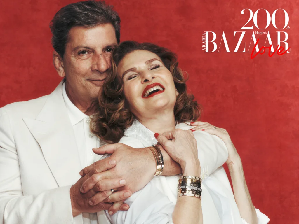 Youssra and Khaled wear Cartier Love Jewellery, all Cartier. Youssra wears: Vest; Trousers, both Róhe at THAT Concept Store. Shirt, Marina Rinaldi. Khaled wears: Blazer, Suitsupply. Shirt, Boss.