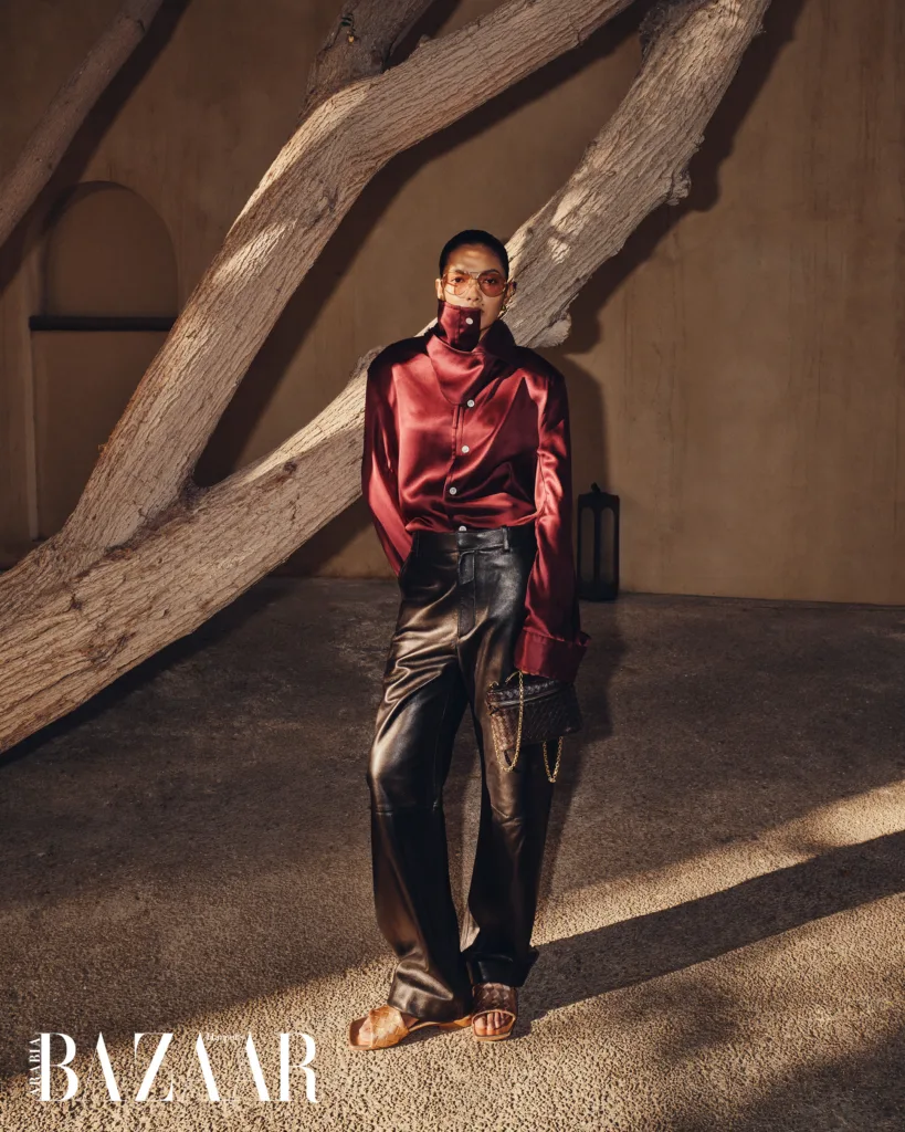Bottega Veneta belted shirt, trousers, and sunglasses