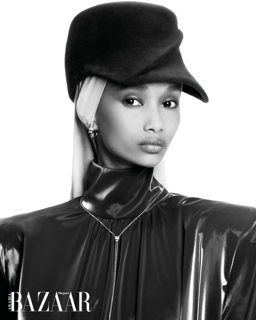 Boucheron Jewellery, Christian Siriano dress, Philip Treacy hat, and scarf from the Maya collection
